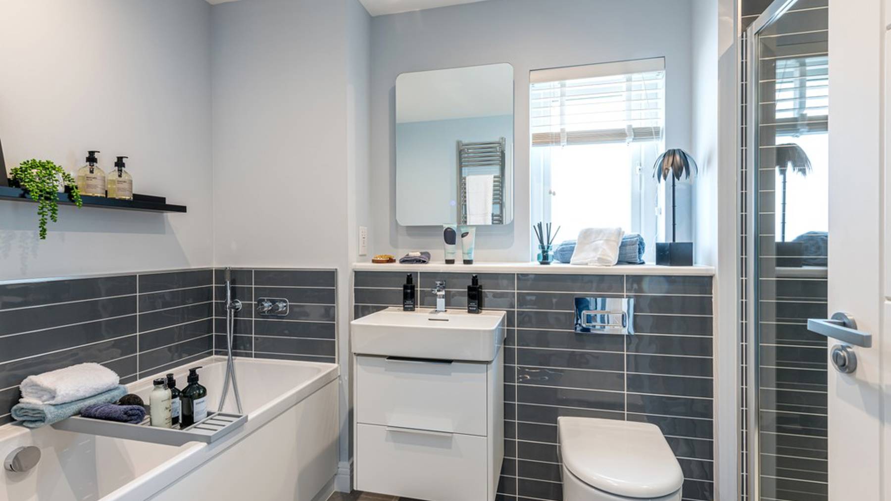 5 bedroom showhome | luxury family bathroom with separate bath and walk-in shower