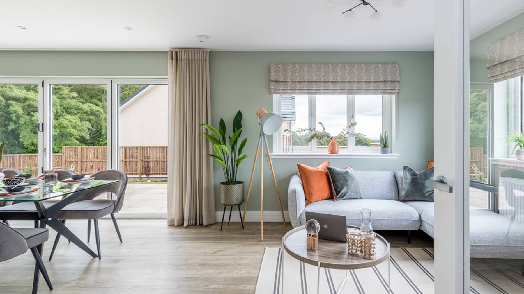 4 bedroom showhome | open plan kitchen, dining and family area with bi-fold doors to rear garden