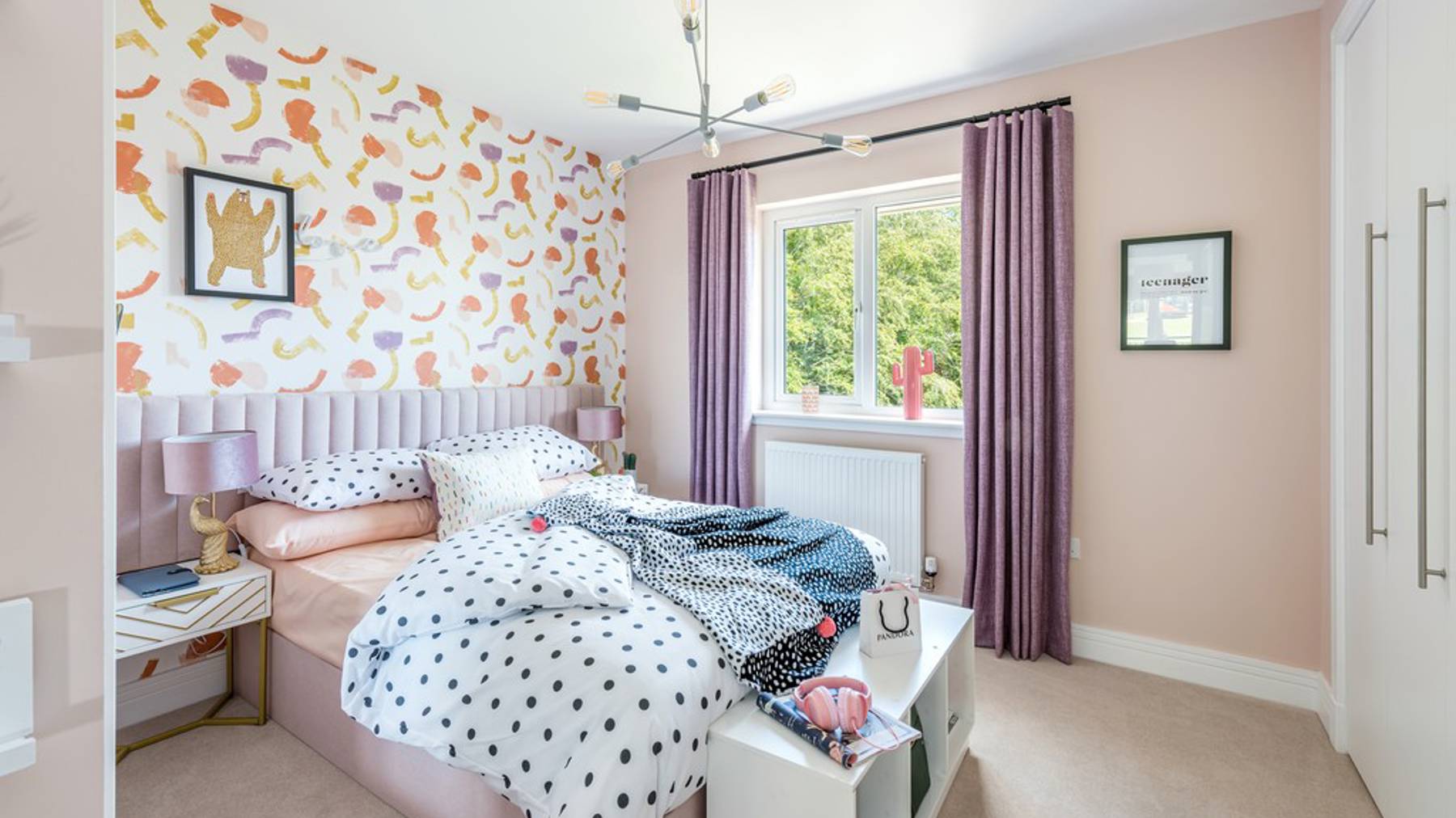 5 bedroom showhome | generous bedroom with built-in storage and soft neutral décor