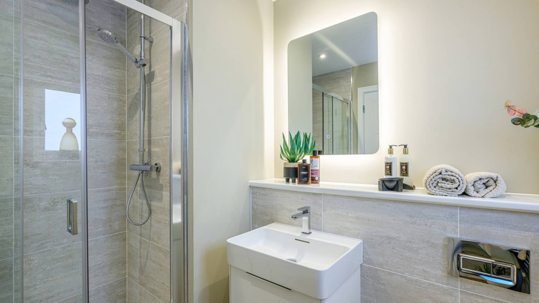 4 bedroom showhome | modern en suite with walk-in shower and chrome fixtures