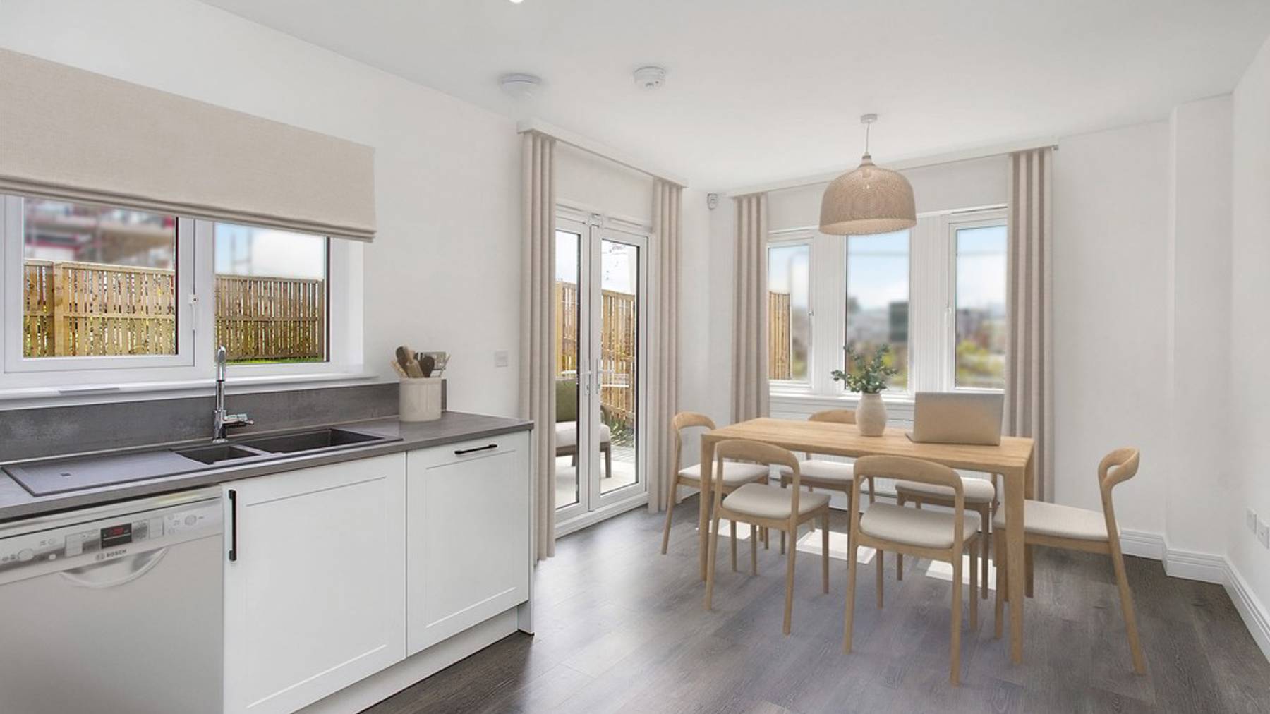 3 bedroom showhome | open plan kitchen and dining area with French doors to rear garden
