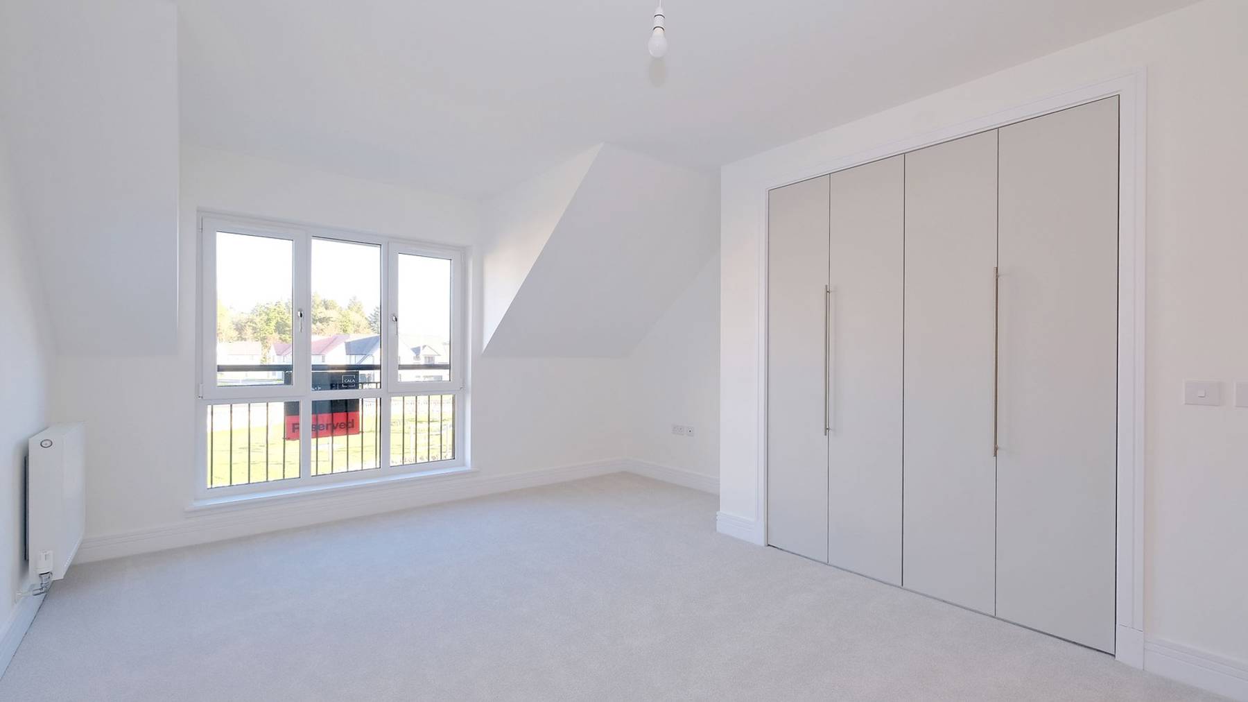 Main bedroom with bright open space and two large double cupboards 