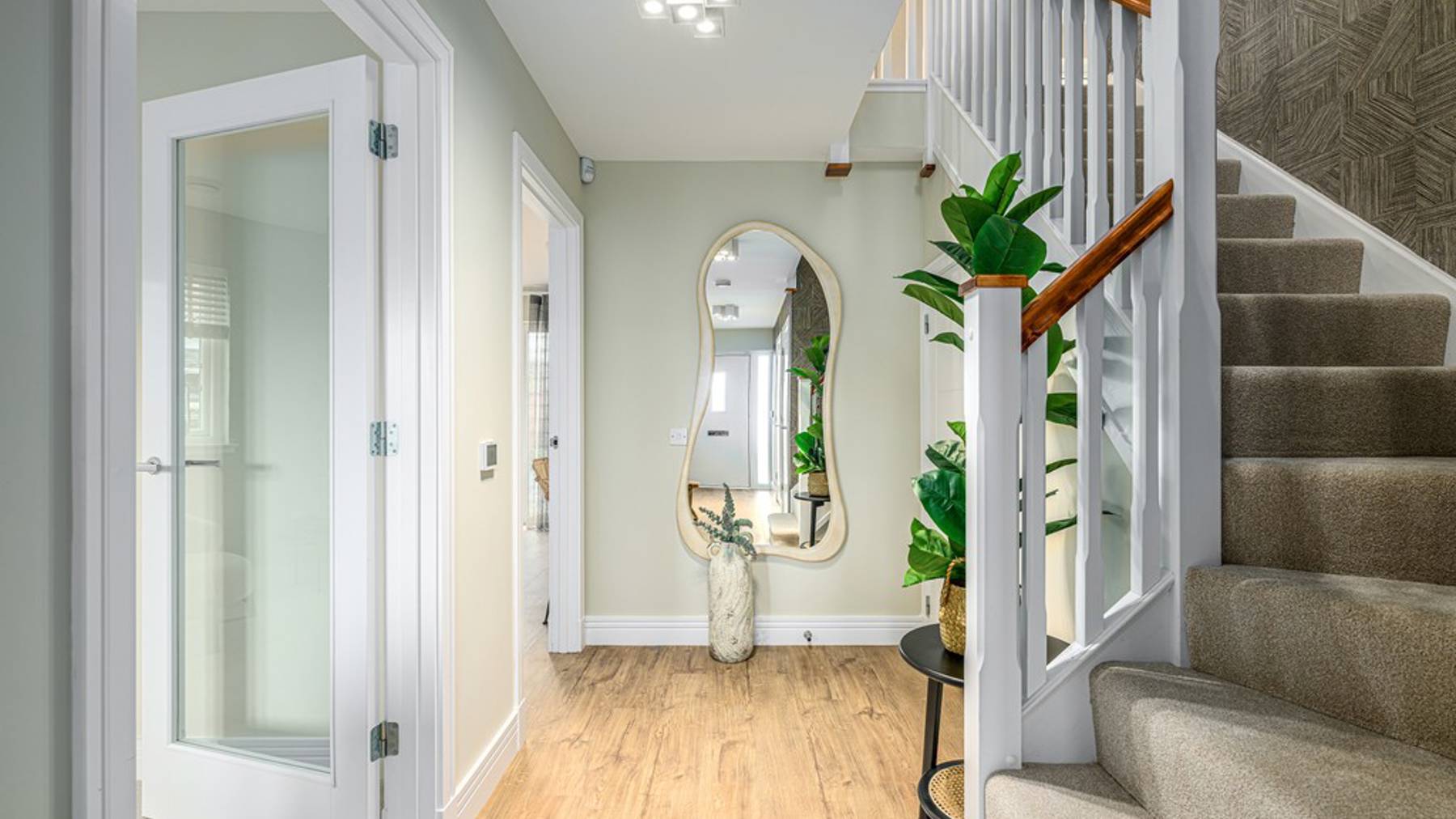 4 bedroom showhome | downstairs hallway with spacious feel