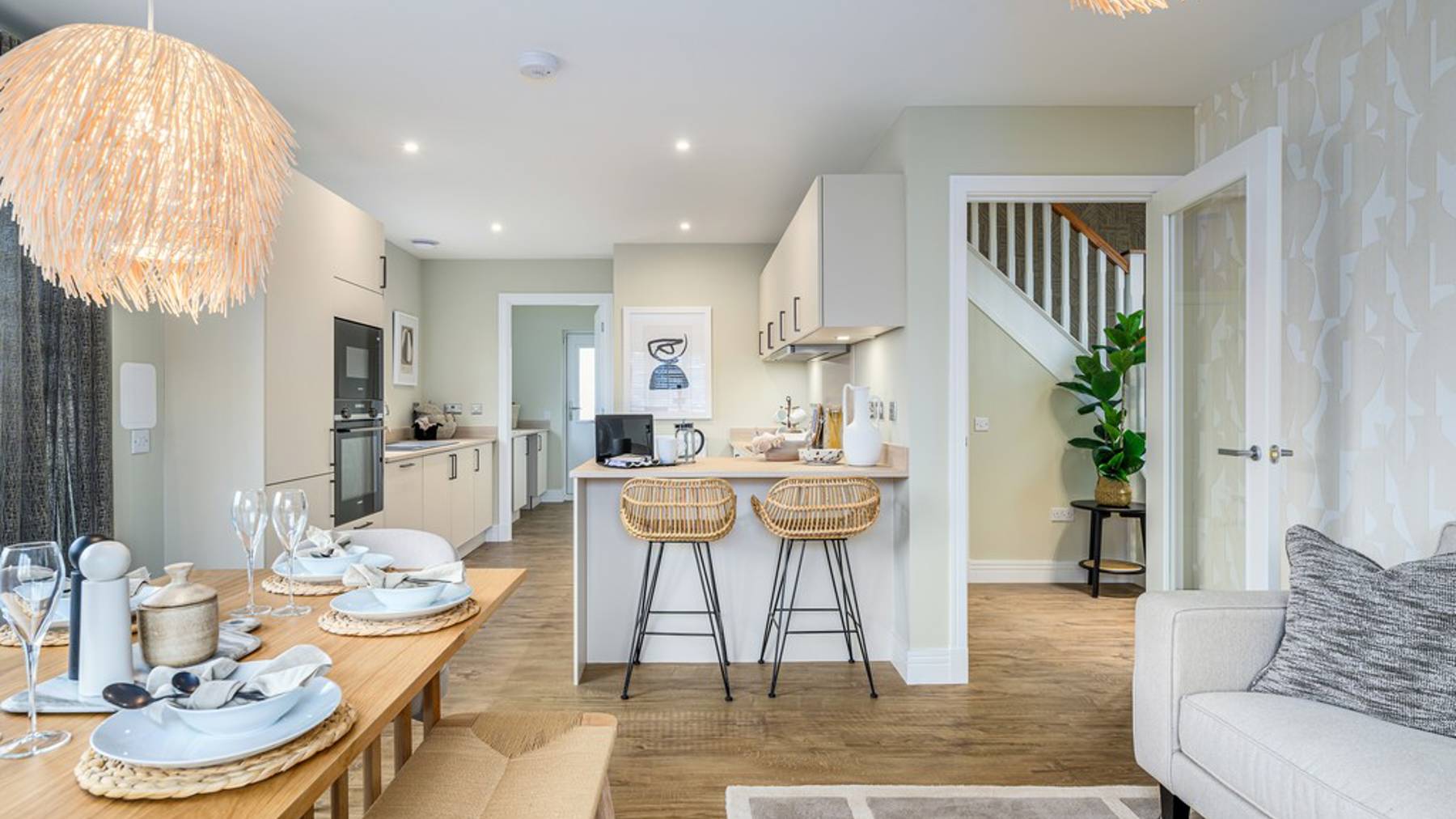4 bedroom showhome | open plan studio-style kitchen, dining and family area with bi-fold doors to rear garden