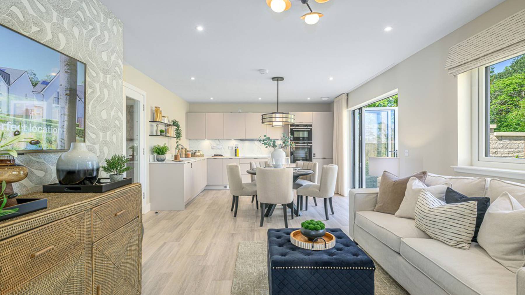 4 bedroom plus study showhome | impressive high spec kitchen, dining and lounge area with bi-fold doors to the garden