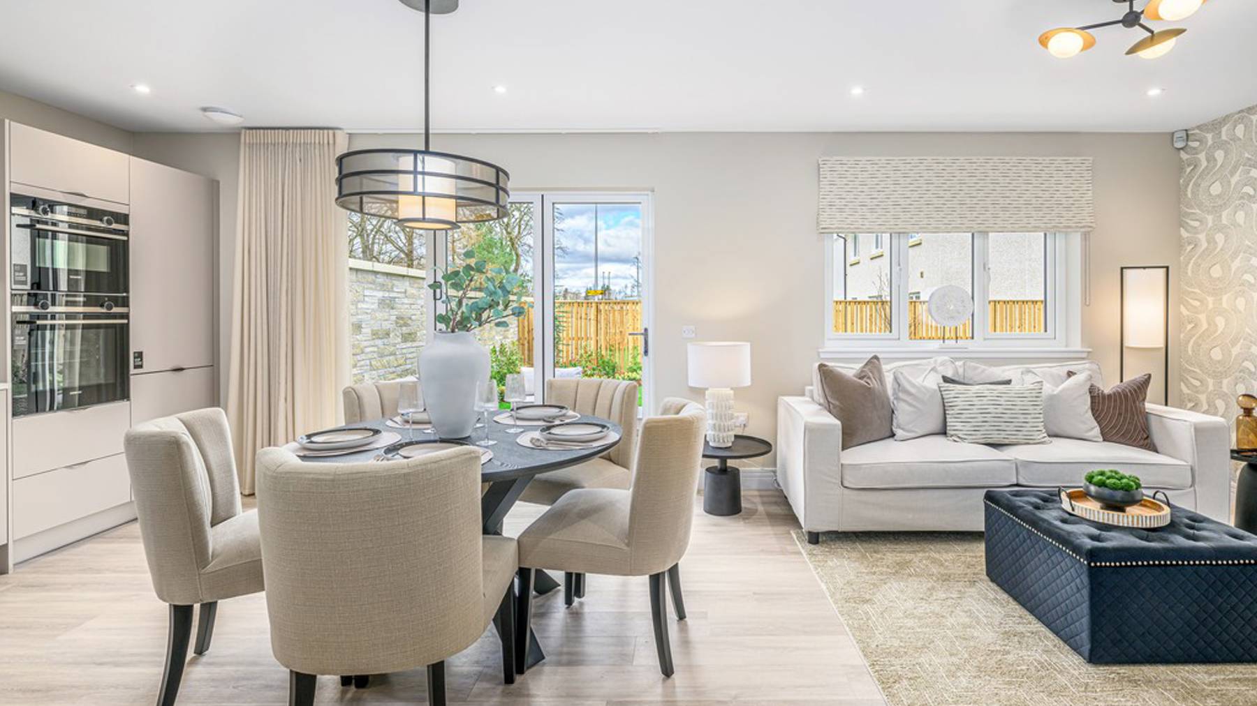 4 bedroom plus study showhome | open plan kitchen, dining and family area with bi-fold doors to rear garden