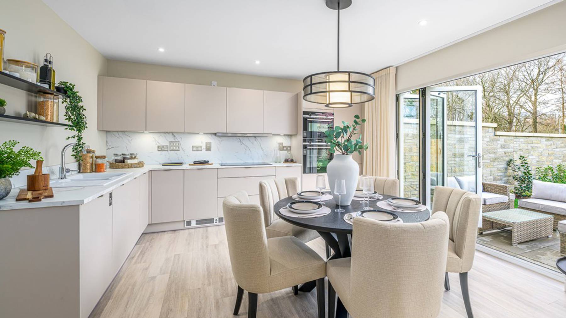 4 bedroom plus study showhome | high spec kitchen & dining area with bi-fold doors to the garden
