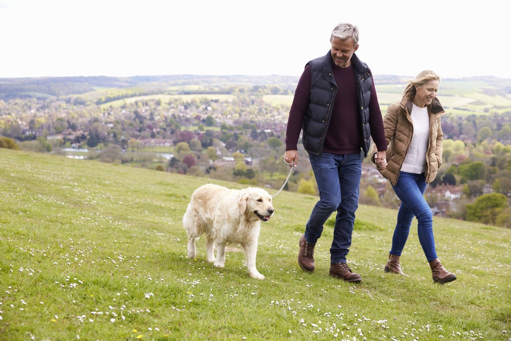 Mature Couple Walking Dog Ufford Chase